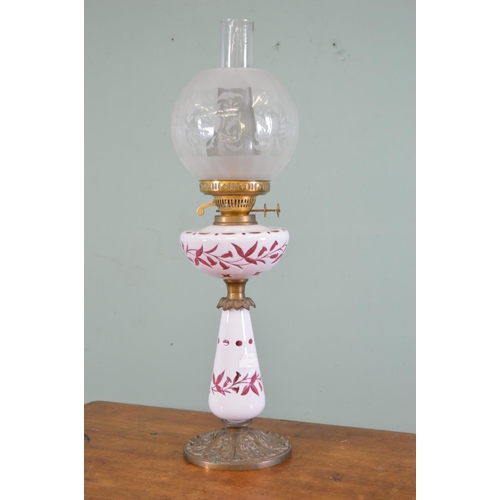 814 - 19th. C.  milk glass with ruby overlay oil lamp mounted on a gilded metal base . { 66cm H X 16cm Dia... 