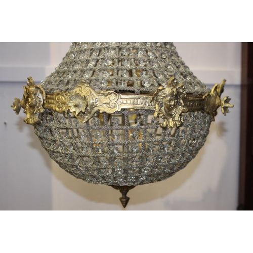 817 - Cut glass and brass six lamp chandelier decorated with floral and mask motifs  { 80cm H X 40cm Dia }... 