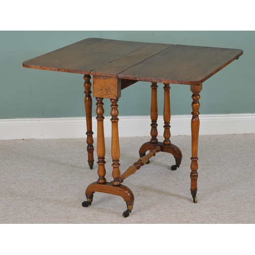 818 - Mahogany Sutherland table raised on twin supports and outswept feet and turned stretcher .{ 72cm H X... 