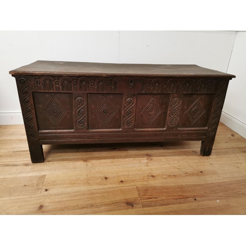 842 - 18th. C. carved oak coffer raised on square legs { 68cm H X 150cm W X 61cm D }.