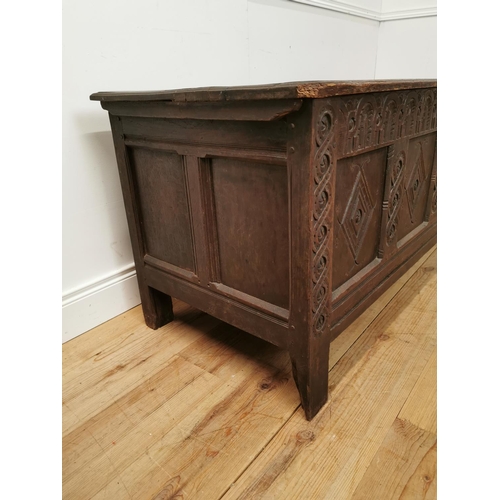 842 - 18th. C. carved oak coffer raised on square legs { 68cm H X 150cm W X 61cm D }.