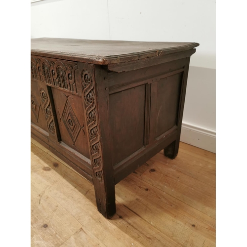 842 - 18th. C. carved oak coffer raised on square legs { 68cm H X 150cm W X 61cm D }.