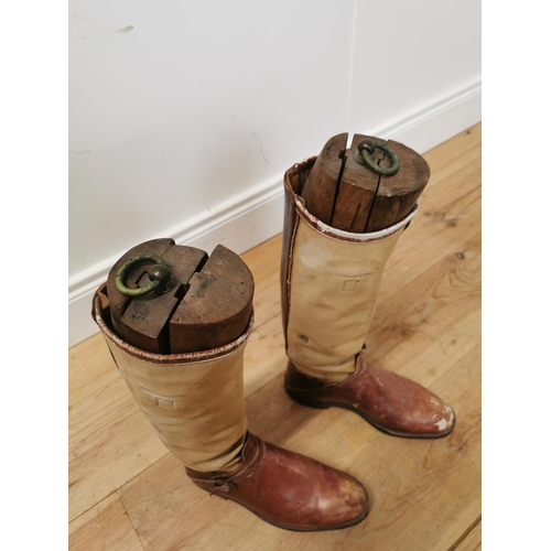 847 - Pair of 20th. C. canvas and leather riding boots with wooden trees { 50cm H X 28cm W X 10cm D }.