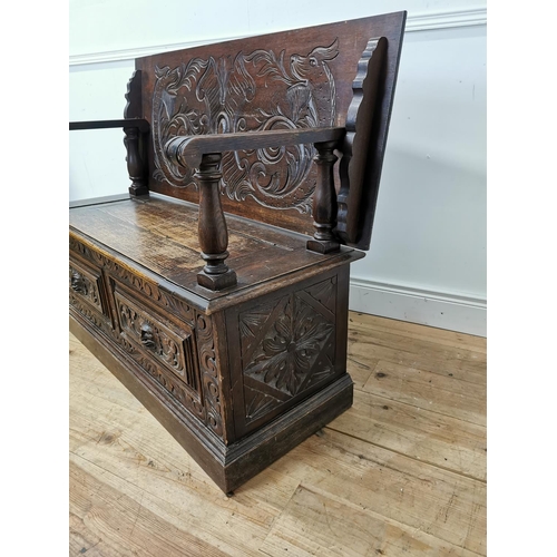 849 - 19th. C. carved oak metamorphic monk's bench table  { 96cm H X 121cm W X 51cm D }.