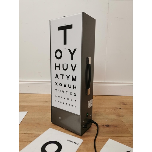 858 - Collection of Optician's testing charts and light up box. { 59cm H X 20cm W X 12cm D }.