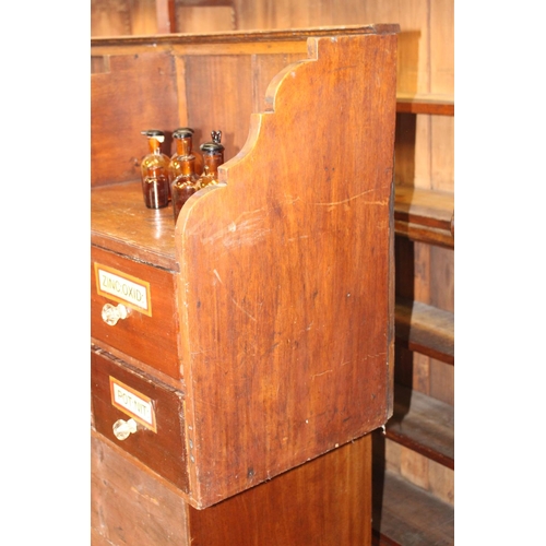 882 - Chemist's mahogany bank of eight drawers { 64cm H X 117cm W X 40cm D }.