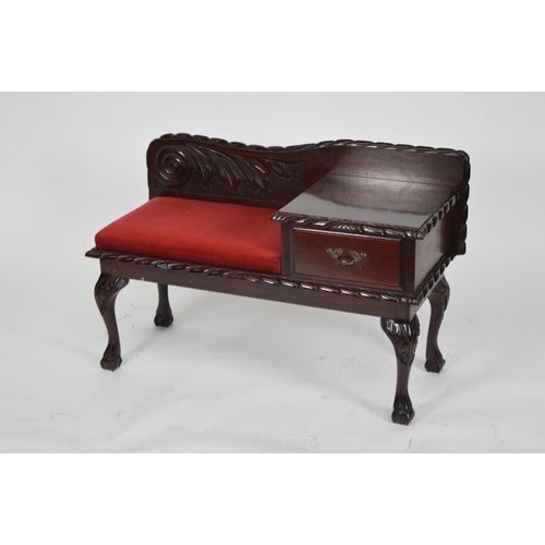 883 - Carved mahogany hall / telephone table raised on cabriole legs