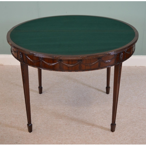 884 - 19th C. mahogany demi - lune turn over leaf games table raised on square tapered legs and spade feet... 