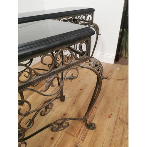 891 - Pair of decorative metal consul tables with marble tops { 79cm H X 110cm W X 53cm D }.