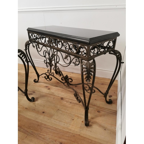 891 - Pair of decorative metal consul tables with marble tops { 79cm H X 110cm W X 53cm D }.