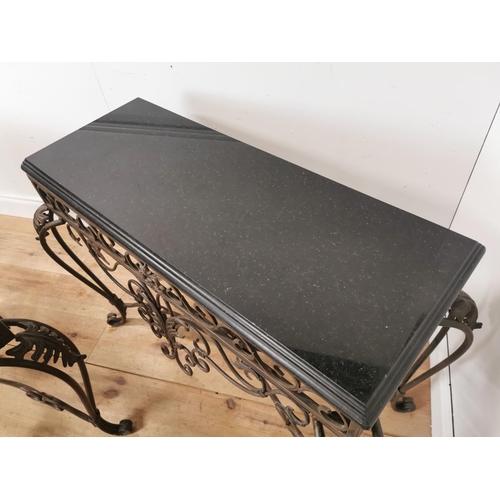 891 - Pair of decorative metal consul tables with marble tops { 79cm H X 110cm W X 53cm D }.