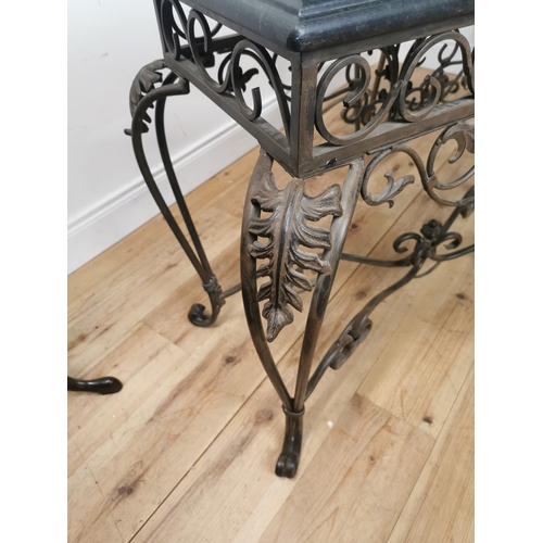 891 - Pair of decorative metal consul tables with marble tops { 79cm H X 110cm W X 53cm D }.