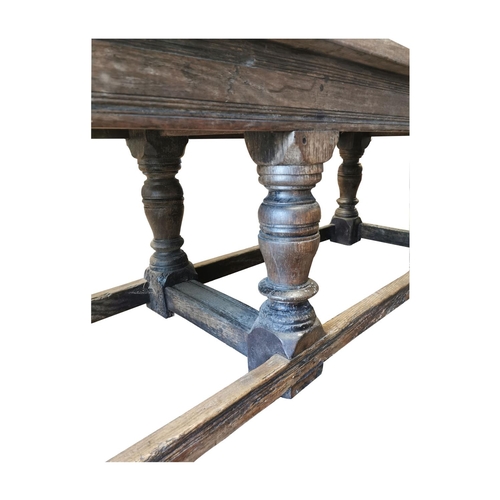 894 - 17th. C. oak refectory table with carved frieze and raised on turned bulbous legs and stretchers { 8... 