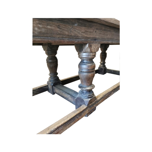 894 - 17th. C. oak refectory table with carved frieze and raised on turned bulbous legs and stretchers { 8... 