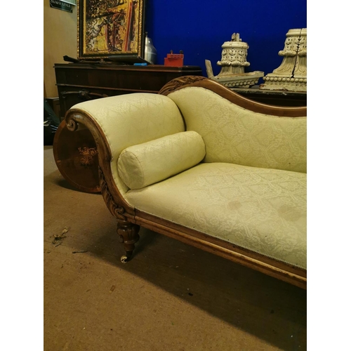 912 - 19th. C. upholstered carved mahogany double ended sofa raised on legs decorated with acanthus leaves... 