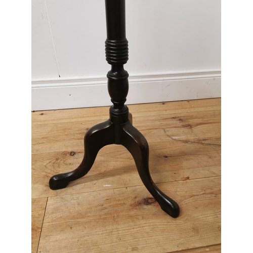 924 - Edwardian mahogany torchere raised on turned column and three outswept feet.  { 109cm H X 31cm Dia }... 