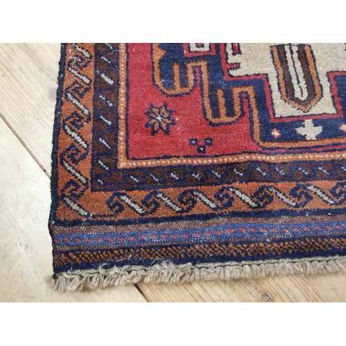 929 - Persian100% wool hand knotted rug { 144cm L X 86cm W }.