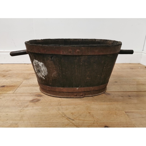 931 - Early 20th. C. oak metal bound log bucket { 30cm H X 80cm W X 40cm D }.