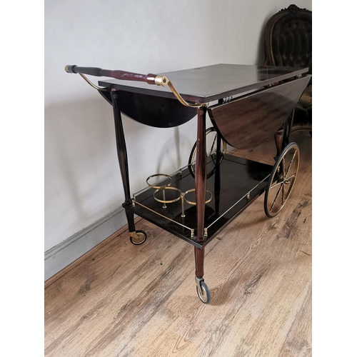 948 - Retro brass and veneered drinks' trolley {76 cm H x 87 cm W x 49 cm D}.