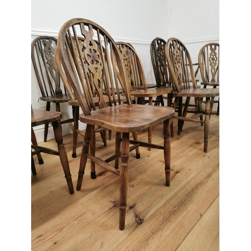 992 - Harlequin set of ten plus two pine wheel slat backed kitchen chairs { approx. 97cm H X 40cm W X 48cm... 