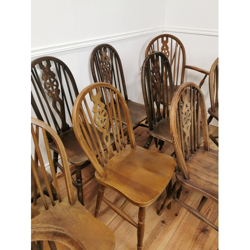 992 - Harlequin set of ten plus two pine wheel slat backed kitchen chairs { approx. 97cm H X 40cm W X 48cm... 