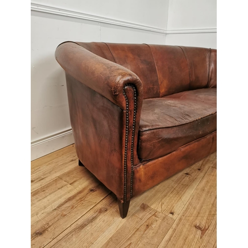 997 - Early 20th. C. French hand dyed cigar leather upholstered two seater couch raised on tapered legs { ... 