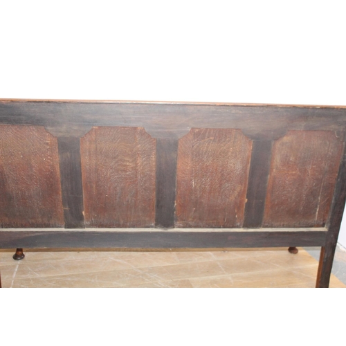 101 - 19th. C. oak settle with upholstered cushion raised on Queen Ann style legs { 106cm H X 183cm W X 68... 