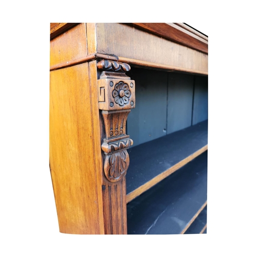 819 - Late 19th. C. carved walnut open floor bookcase with adjustable shelves raised on plinth base { 118c... 