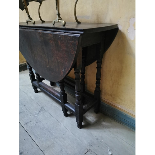 828 - 19th. C. oak double drop leaf gate legged table. { 72cm H X 103cm W X 90cm D }.