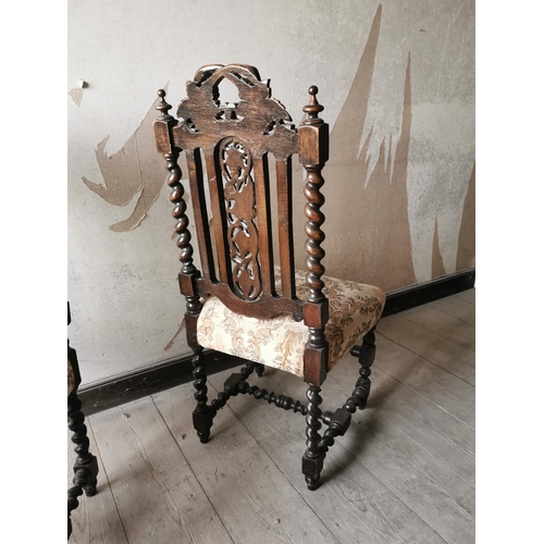 831 - Pair of carved oak hall chairs with upholstered seats { 107cm H X 49cm W X 45cm D }.