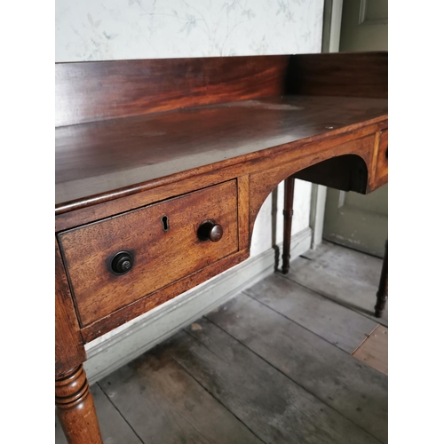 833 - Georgian mahogany side table the gallery back above two short drawers In the frieze raised on ringed... 