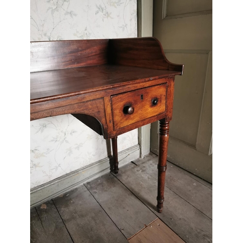 833 - Georgian mahogany side table the gallery back above two short drawers In the frieze raised on ringed... 