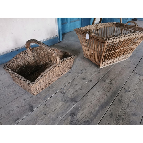 875 - Two 19th. C. Wicker bread baskets { 43cm H X 74cm W X 33cm D & 35cm H X 52cm W X 46cm D }.