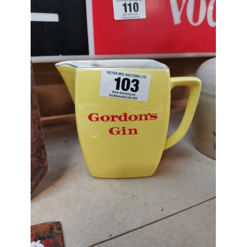 103 - Gordon's Gin ceramic advertising water jug {13 cm H x 15 cm W x 9 cm D}.