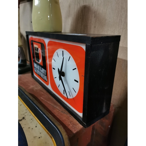 125 - Draught Guinness perspex and wood battery operated advertising Clock. {20 cm H x 37 cm W x 9 cm D}.