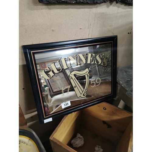 135 - Guinness framed advertising mirror. {37 cm H x 47 cm W}.