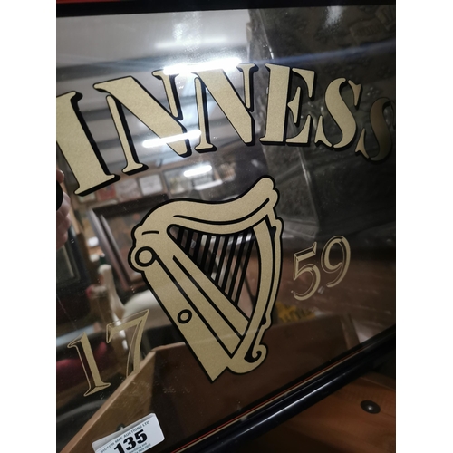 135 - Guinness framed advertising mirror. {37 cm H x 47 cm W}.