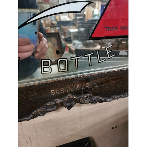 138 - Bass in bottle advertising mirror in original oak frame {57 cm H x 87 cm W}.