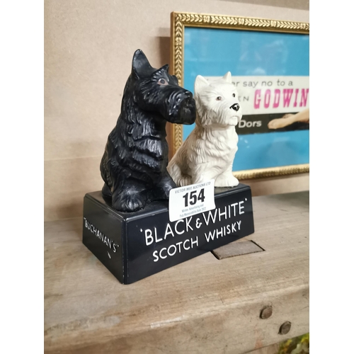 154 - Perspex Black and White Scottie Dogs advertising figure. {16 cm H x 14 cm W x 8 cm D}.