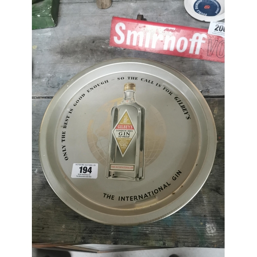 194 - Gilbey's Gin drink's tin plate advertisingtray {32 cm Dia}.