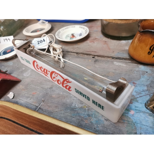 204 - Perspex Ice Cold Coca Cola Served Here light up shelf advertising sign. {5 cm H 31 cm W x 5 cm D}.