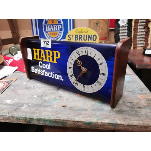 212 - Harp Lager advertising battery clock. { 16 cm H x 33 cm W x 8 cm D}.