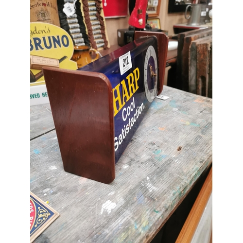 212 - Harp Lager advertising battery clock. { 16 cm H x 33 cm W x 8 cm D}.