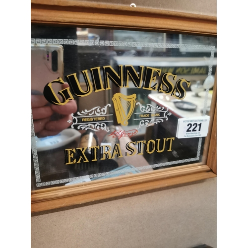 221 - Guinness Extra Stout framed advertising mirror {21 cm H x 27 cm W}.