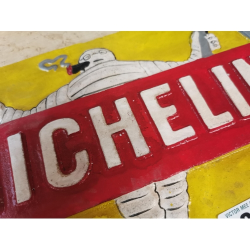 230 - Michelin Tyre Man cast iron advertising  plaque . {20 cm H x 30 cm W}.