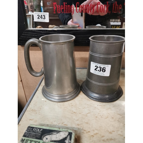 236 - Two pewter tankards � Winner of Jubilee Cup Chesham 1962 and another. {14 cm H x 13 cm W x 10 cm D}.