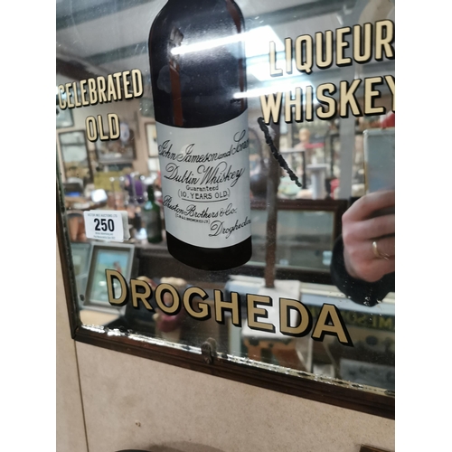 250 - Preston Bros of Drogheda Celebrated Liquer Whiskey framed advertising mirror. {52 cm H x 37 cm W}.