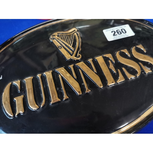 260 - Guinness ceramic oval advertising sign. {22 cm H x 22 cm W}.