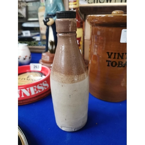 261 - Cairnes and Co Belfast stoneware advertising Ginger Beer Bottle. {21 cm H x 7 cm Dia}.