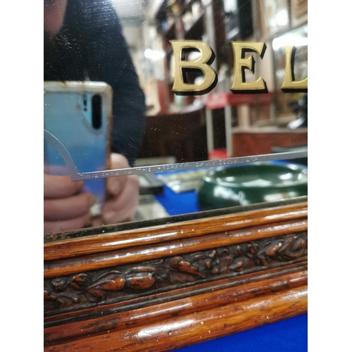 281 - Early 20th C. Cowan�s Old Irish Whiskey Belfast framed advertising mirror decorated with shamrocks. ... 